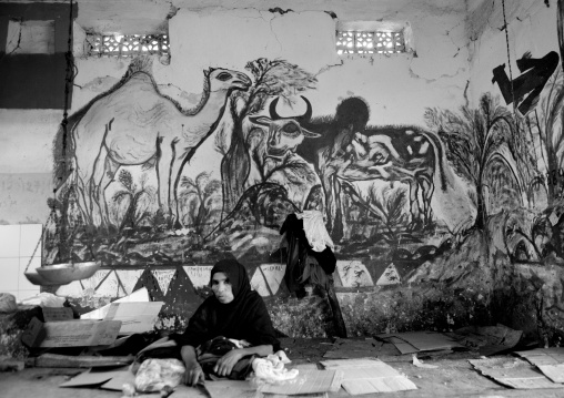 A Woman Sat On The Floor In Front Of A Livestock Fresco, Hargeisa Market, Somaliland