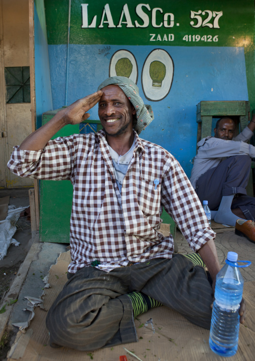 A Smiling Man Sitting On A Piece Of Cardboard, Hargeisa, Somaliland