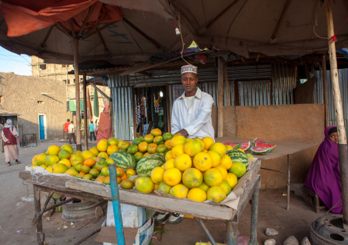 Somali man selling fruits in the street, Woqooyi Galbeed region, Hargeisa, Somaliland