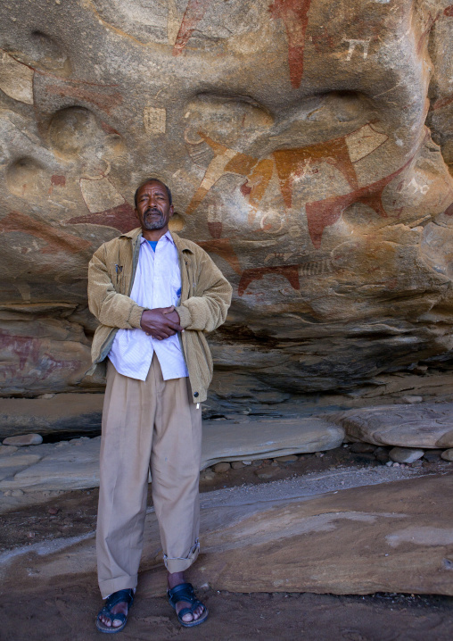 Laas Geel Rock Art Caves, Guide Standing In The Cave, Hargeisa, Somaliland