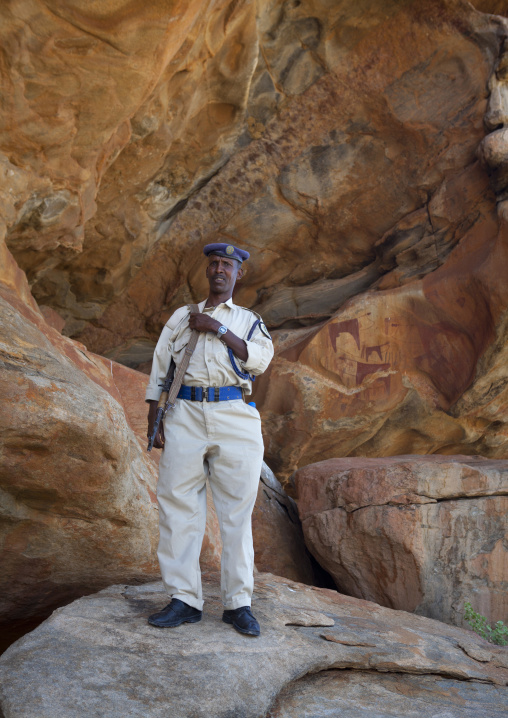 Laas Geel Rock Art Caves, Guide Standing In The Cave, Somaliland