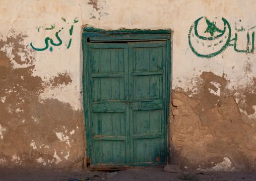 Green wooden door of an old house, North-Western province, Berbera, Somaliland