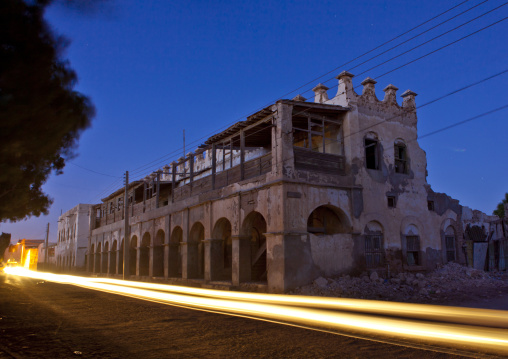 A Car Passing By A Former Ottoman Empire House By Night, Berbera, Somaliland