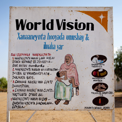 A Painted Billboard Advertising For World Vision NGO Representing A Woman Breastfeeding Her Baby, Baligubadle, Somaliland