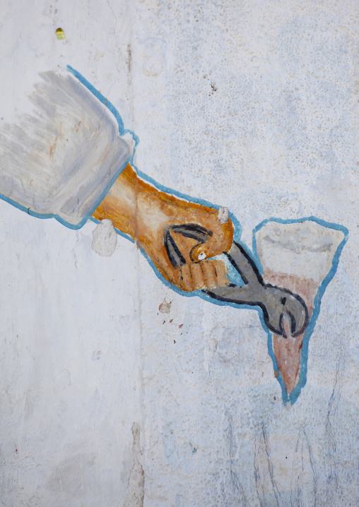 A Painted Sign Advertising For A Dentist Depicting A Tooth Removal, Boorama, Somaliland