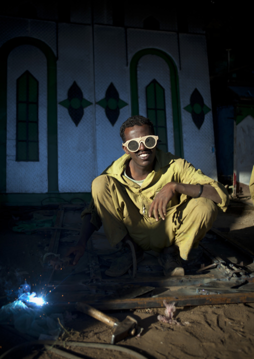 Portrait Of A Soldering Man Wearing Yellow Protection Sunglasses, Boorama, Somaliland