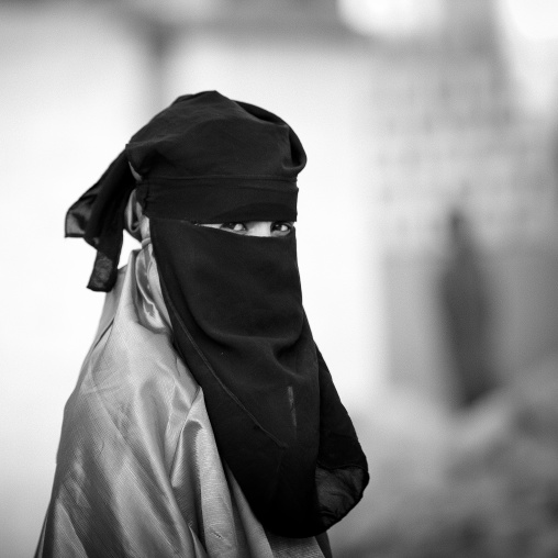 Black And White Portrait Of A  Woman Wearing A Black Niqab, Boorama, Somaliland