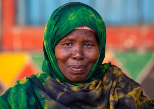 Portrait of a somali woman with a green hijab, Awdal region, Zeila, Somaliland