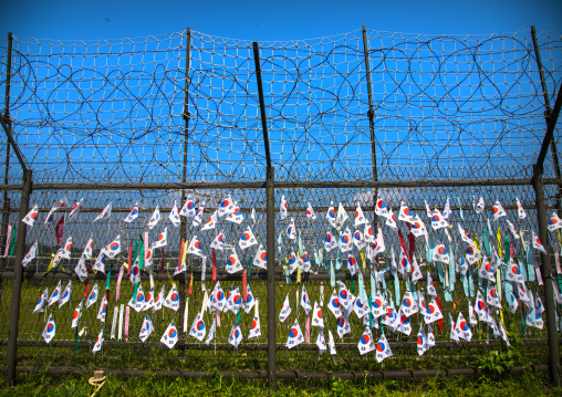 Messages of peace and unity written on ribbons left on fence at DMZ, North Hwanghae Province, Panmunjom, South Korea