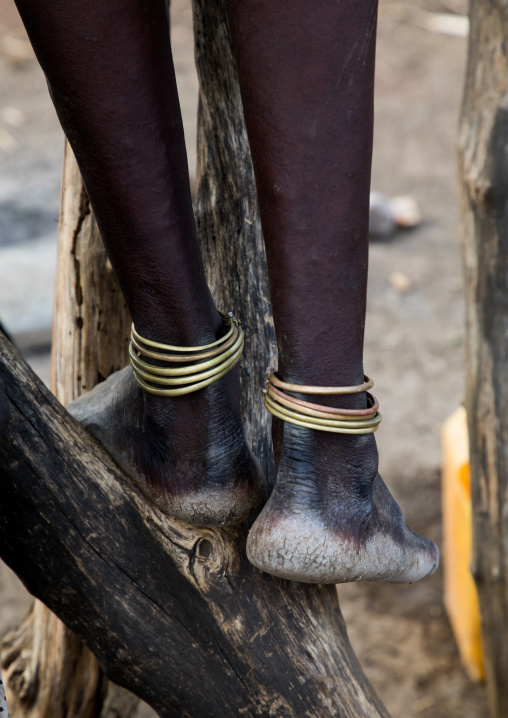 Anklets on the legs of a Toposa tribe girl, Namorunyang State, Kapoeta, South Sudan
