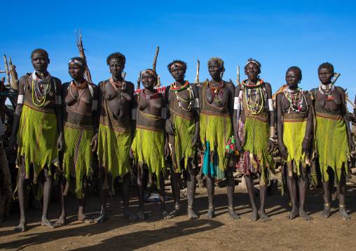 Toposa tribe women in traditional clothing during a ceremony, Namorunyang State, Kapoeta, South Sudan
