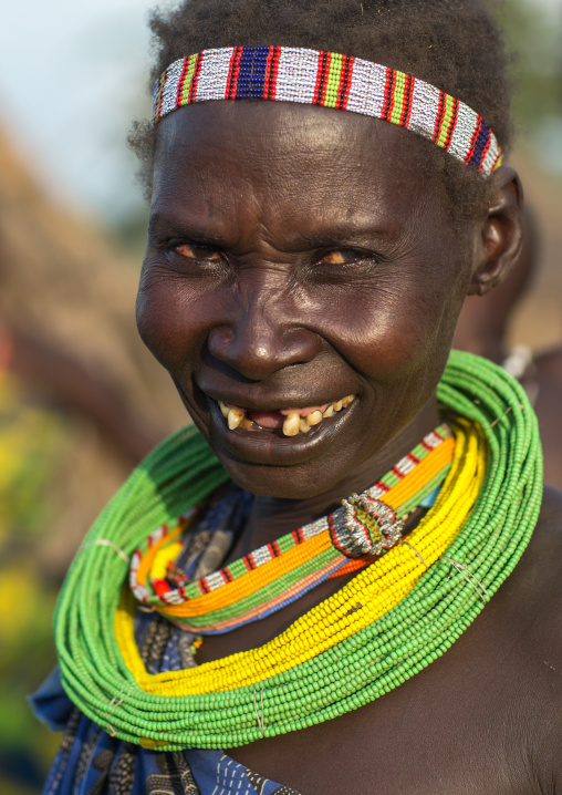 Portrait of a smiling Toposa tribe woman, Namorunyang State, Kapoeta, South Sudan