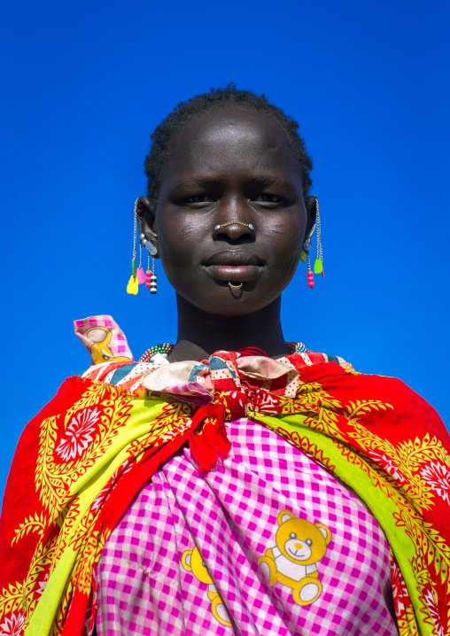 Portrait of a Larim tribe woman with eaerrings and Nose earrings, Boya Mountains, Imatong, South Sudan