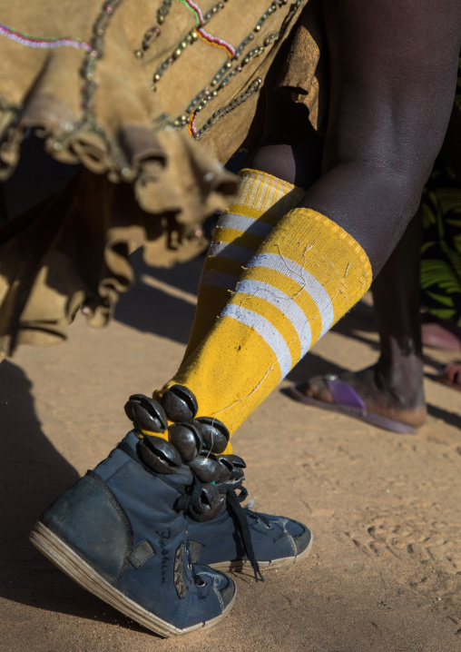 Bells on the shoes of a Larim tribe woman during a wedding ceremony, Boya Mountains, Imatong, South Sudan