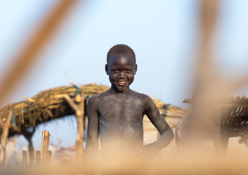 Smiling Mundari tribe boy in a cattle camp, Central Equatoria, Terekeka, South Sudan