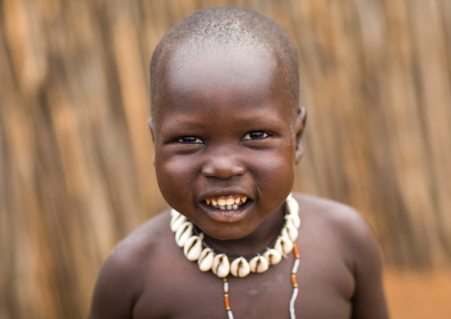 Portrait of a smiling Larim tribe boy, Boya Mountains, Imatong, South Sudan