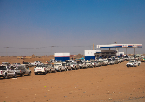 Sudanese people in their cars queue on line at a gas station during the fuel shortages, Kassala State, Kassala, Sudan