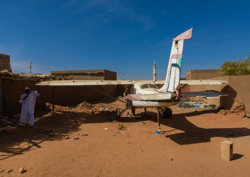 Old propeller airplane parked in a village, Khartoum State, Omdurman, Sudan