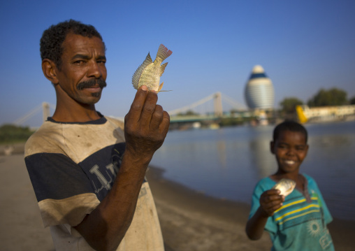 Sudan, Khartoum State, Khartoum, fishermen on nile river bank