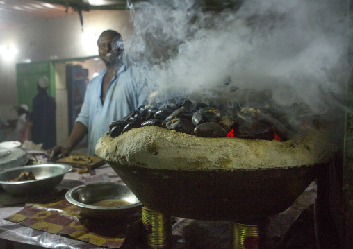 Sudan, Kassala State, Kassala, meat cooked on heated stones