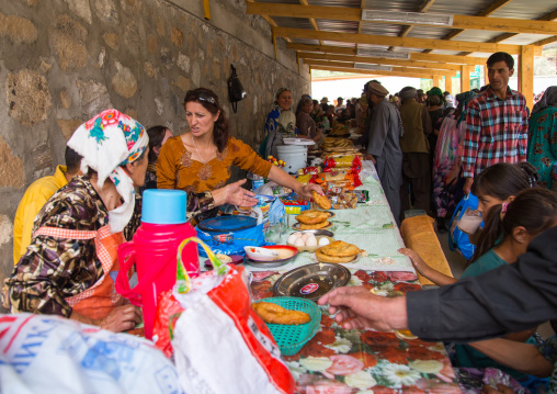 Tajik women selling food in the market border with Afghanistan, Central Asia, Ishkashim, Tajikistan