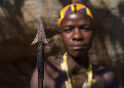 Tanzania, Serengeti Plateau, Lake Eyasi, hadzabe tribe holding an arrow