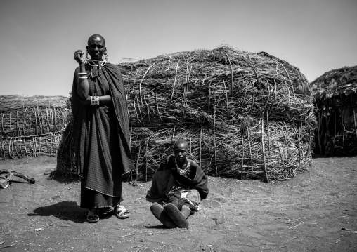 Tanzania, Ashura region, Ngorongoro Conservation Area, maasai women outside their home