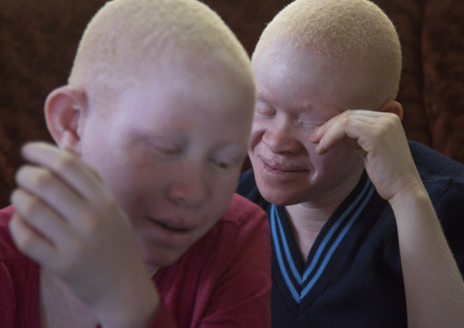 Tanzania, East Africa, Dar es Salaam, albinos teens at under the same sun house
