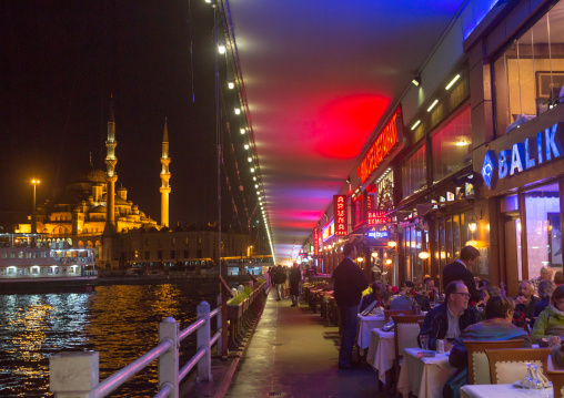 Restaurants under Galata bridge at night, Galata, istanbul, Turkey