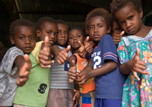 Portrait of children with thumbs up, Shefa Province, Efate island, Vanuatu