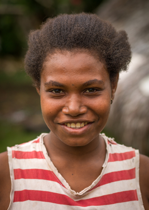 Portrait of a smiling Ni-Vanuatu young woman, Shefa Province, Efate island, Vanuatu
