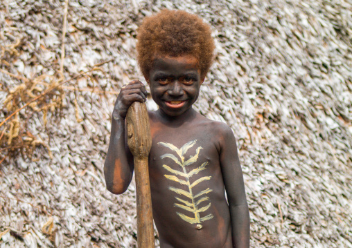 Portrait of a smiling boy during the palm tree dance of the Small Nambas tribe, Malekula island, Gortiengser, Vanuatu