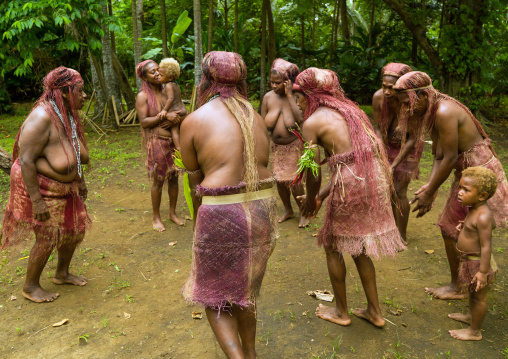 Women from Big nambas tribe performing the dance sticks during a ceremony, Malampa Province, Malekula Island, Vanuatu