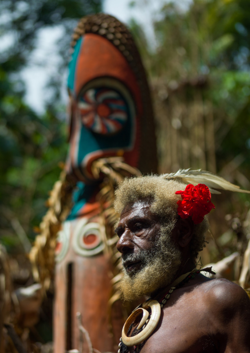 Portrait of chieftain Etul in front of a giant slit drum, Ambrym island, Fanla, Vanuatu