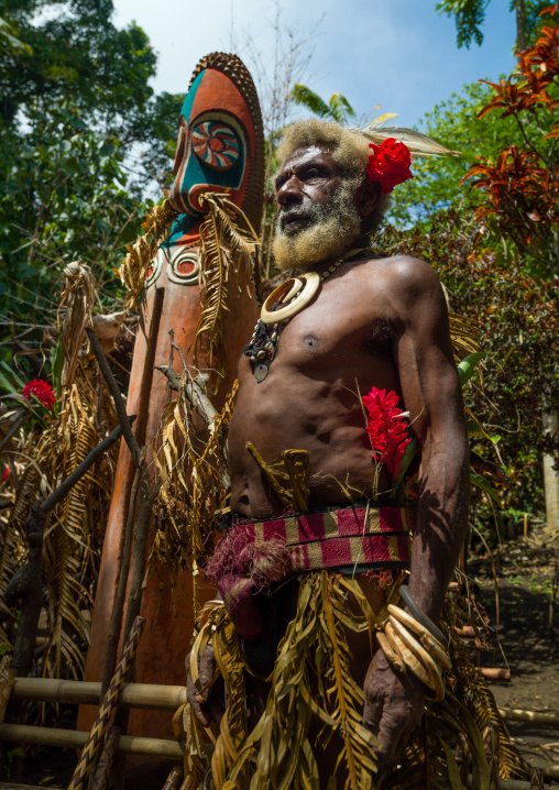 Portrait of chieftain Etul in front of a giant slit drum, Ambrym island, Fanla, Vanuatu