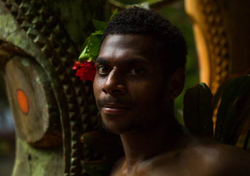 Tribesman in front of slit drums, Ambrym island, Fanla, Vanuatu