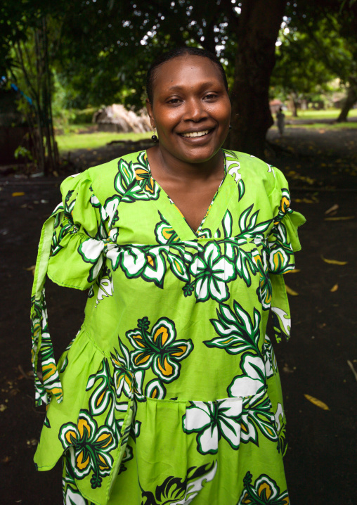 Portrait of a ni-vanuatu woman in green dress, Malampa Province, Ambrym island, Vanuatu