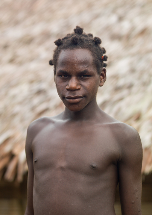 Ni-Vanuatu young man with a special hairstyle, Sanma Province, Espiritu Santo, Vanuatu