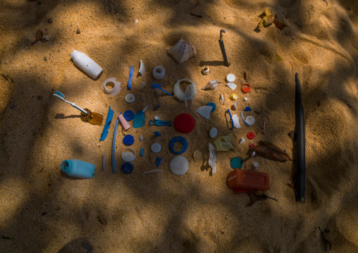 Trashes used as toys by children on a beach, Sanma Province, Espiritu Santo, Vanuatu
