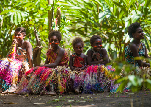 Traditional dance with girls in colorful clothes and grass skirts, Tanna island, Epai, Vanuatu