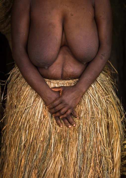 Topless woman with a traditional grass skirt, Tanna island, Yakel, Vanuatu