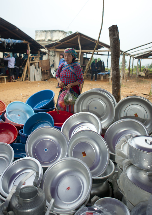 Woman looking at bowls at sapa market, Vietnam