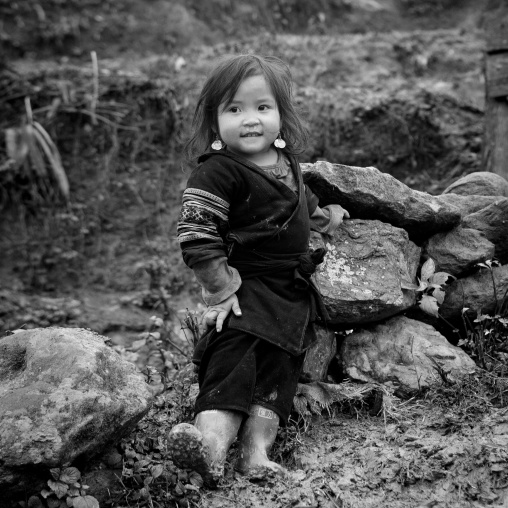 Cute young black hmong girl in traditional clothes, Sapa, Vietnam