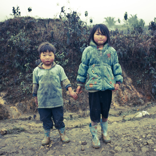 Black hmong brother and sister holding each other s hand, Sapa, Vietnam