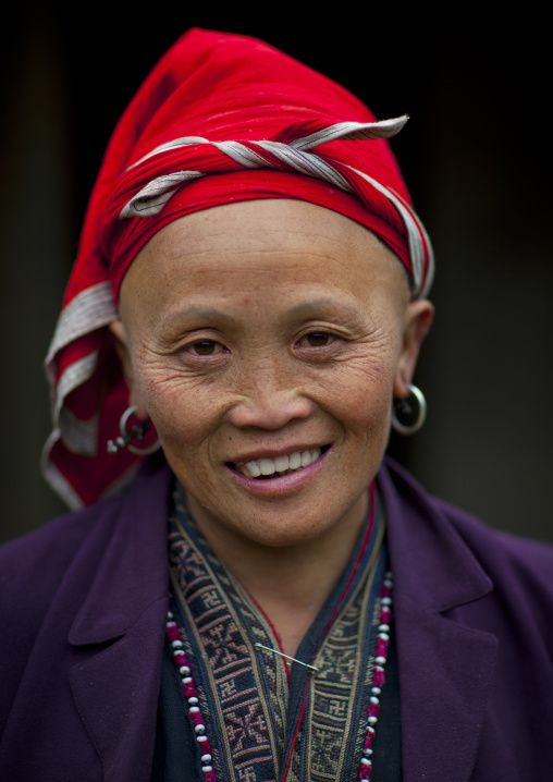 Old red dzao woman with a red headscarf, Sapa, Vietnam