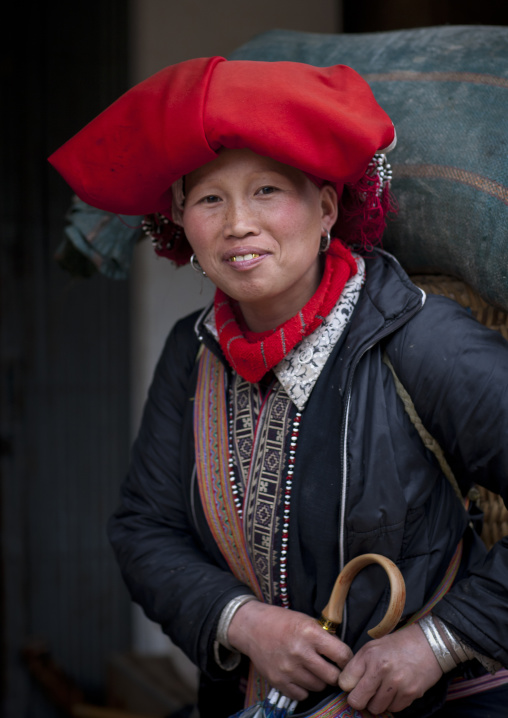 Red dzao woman with a red headgear, Sapa, Vietnam
