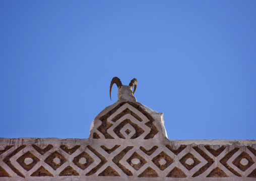 Ibex Horns On The Top Of A Traditionnaly Sculpted Roof In Sanaa, Yemen
