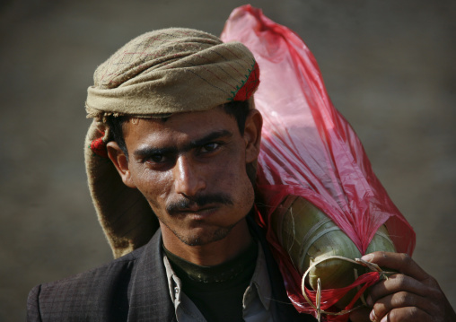 Shahara Man Chewing Kat And Carrying A Bag On His Shoulder, Shahara, Yemen