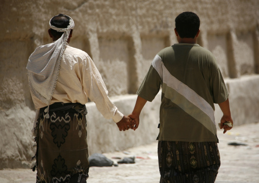 Two Men Holding Hands As A Sign Of Friendship, Tarim,  Yemen