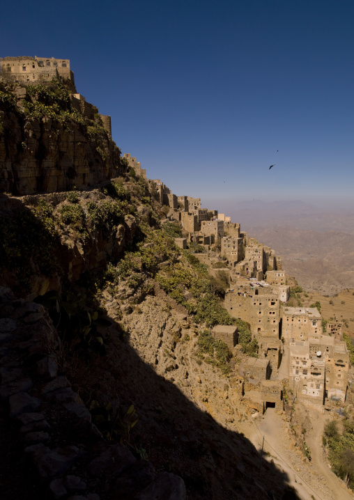 Village Of Kholan Merging With The Mountain Over The Cultivated Terrace, Kholan, Yemen